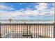 Balcony view showcasing the ocean, beach, and clear blue sky at 2700 N Atlantic Ave # 454, Daytona Beach, FL 32118