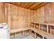 Relaxing sauna room, featuring wooden benches, stone heater, and wood-paneled walls and ceiling at 2700 N Atlantic Ave # 454, Daytona Beach, FL 32118