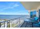 Enjoy water views from the balcony with table and chairs with sliders into the condo at 2801 S Ridgewood Ave # 1214, South Daytona, FL 32119