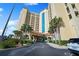 Exterior of building shows elegant architecture and landscaping at 2801 S Ridgewood Ave # 1214, South Daytona, FL 32119