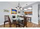 Dining area featuring elegant chandelier lighting and bar stool seating at 2801 S Ridgewood Ave # 1214, South Daytona, FL 32119