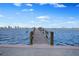 Picturesque waterfront view from the private wooden dock overlooking the ocean and city skyline at 2801 S Ridgewood Ave # 1214, South Daytona, FL 32119