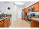 Kitchen features stainless steel appliances, granite countertops, and tile flooring at 2801 S Ridgewood Ave # 1214, South Daytona, FL 32119