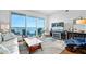Stylish living room with modern furniture and a large glass sliding door that leads to a balcony at 2801 S Ridgewood Ave # 1214, South Daytona, FL 32119