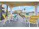 Covered picnic area with colorful tables and chairs, plus a built-in grill at 2801 S Ridgewood Ave # 1214, South Daytona, FL 32119