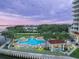 Relaxing poolside with lounge chairs, a covered cabana and beautiful waterfront views at 2801 S Ridgewood Ave # 1214, South Daytona, FL 32119