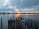 Enjoy the view of the cityscape at sunset from the private fishing pier at 2801 S Ridgewood Ave # 1214, South Daytona, FL 32119