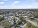 Breathtaking aerial view showcasing a community with tree-lined streets and lush greenery at 2821 Oak Lea Dr, South Daytona, FL 32119