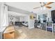 Open-concept living area with tile flooring, neutral walls, and natural light at 2821 Oak Lea Dr, South Daytona, FL 32119
