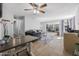 Open-concept living room featuring tile flooring and abundant natural light at 2821 Oak Lea Dr, South Daytona, FL 32119