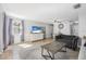 Inviting living room with stylish furniture and a neutral color palette at 2821 Oak Lea Dr, South Daytona, FL 32119