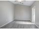 Comfortable bedroom with hardwood floors, ceiling fan, and neutral color palette at 2841 Idleweise Dr, Deltona, FL 32738