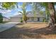 Lovely home showcasing a manicured lawn and a cozy, welcoming entrance at 2841 Idleweise Dr, Deltona, FL 32738