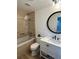 Beautifully remodeled bathroom with walk-in shower and modern vanity at 2929 Carriage Dr, South Daytona, FL 32119
