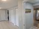 Entryway featuring tile flooring, closet space, and an open transition to the living area at 305 Elsie Ave, Daytona Beach, FL 32117