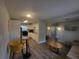 Open-concept living area with modern kitchen, dining space, and comfortable living room at 305 Elsie Ave, Daytona Beach, FL 32117