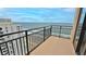 Enjoy ocean views from this condo's private balcony with a black metal safety rail at 3051 S Atlantic Ave # 2206, Daytona Beach, FL 32118