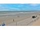 View of the beach showing the beach and the beautiful skyline with people having fun at the beach at 3051 S Atlantic Ave # 2206, Daytona Beach, FL 32118