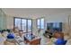 Comfortable living room with large sliding glass doors and stunning ocean views at 3051 S Atlantic Ave # 2206, Daytona Beach, FL 32118