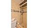 Tiled shower with shampoo caddy in this bathroom at 3051 S Atlantic Ave # 2206, Daytona Beach, FL 32118