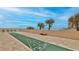 Shuffleboard court with ocean view and palm trees and high-rise buildings in the background at 3051 S Atlantic Ave # 2206, Daytona Beach, FL 32118