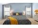 Serene bedroom with natural light, neutral colors, and comfortable bed linens at 3102 Cordgrass Ct, The Villages, FL 32163