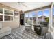 Cozy sunroom with plenty of natural light, comfortable seating, and a relaxing atmosphere at 3102 Cordgrass Ct, The Villages, FL 32163