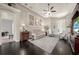 Inviting living room with hardwood floors, ample seating, and a decorative gallery wall at 411 Foxhill Dr, Debary, FL 32713