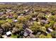 A stunning view of a neighborhood with beautiful homes tucked into mature trees and lush green landscaping at 4612 Reynosa Sw Dr, Winter Haven, FL 33880