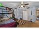Cozy bedroom with a bunk bed, ceiling fan, and closet, ready for personalization at 4612 Reynosa Sw Dr, Winter Haven, FL 33880