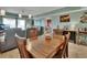 Dining room with seating for four with access to the living room at 4670 Links Village Dr # B706, Ponce Inlet, FL 32127