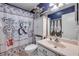 Charming bathroom featuring a decorative shower curtain and soft lighting at 49 Crooked Pine Rd, Port Orange, FL 32128