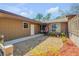 Welcoming front entrance with flag, a cozy seating area, and charming landscaping for added curb appeal at 49 Crooked Pine Rd, Port Orange, FL 32128