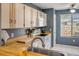 Kitchen boasts butcher block counters, white appliances and a view to the front yard at 49 Crooked Pine Rd, Port Orange, FL 32128