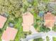 Aerial view of a single-Gathering home showcasing lush landscaping and a pool at 509 Osprey Ln, Winter Springs, FL 32708