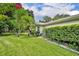 The backyard has lush lawn and manicured landscaping provides a private outdoor oasis at 509 Osprey Ln, Winter Springs, FL 32708