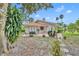 A backyard with a patio area including outdoor seating and a grill, perfect for entertaining at 509 Osprey Ln, Winter Springs, FL 32708