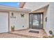 Charming home featuring a brick entryway and decorative butterfly accent at 509 Osprey Ln, Winter Springs, FL 32708