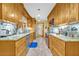 Spacious kitchen featuring granite countertops, stainless steel appliances, and ample cabinet space at 509 Osprey Ln, Winter Springs, FL 32708