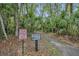 Scenic nature trail surrounded by lush greenery offers a peaceful retreat for residents at 509 Osprey Ln, Winter Springs, FL 32708