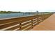 Picturesque wooden boardwalk with views of the marina and waterway, offering a scenic walking experience at 521 Marina Point Dr # 521, Daytona Beach, FL 32114