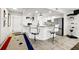 Modern kitchen with white cabinets, granite countertops, and stainless steel appliances at 521 Marina Point Dr # 521, Daytona Beach, FL 32114