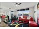 Bright living room with a water view, colorful accents, and stylish furnishings at 521 Marina Point Dr # 521, Daytona Beach, FL 32114