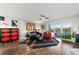 Open living room with contemporary furniture and a water view at 521 Marina Point Dr # 521, Daytona Beach, FL 32114