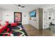 Unique living room with a murphy bed, tv, and colorful decor that offers comfort and style at 521 Marina Point Dr # 521, Daytona Beach, FL 32114