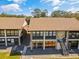 Exterior shot of the apartments showcasing the architecture and the surrounding landscape at 542 Belltower Ave, Deltona, FL 32725