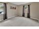 Neutral bedroom featuring gray window treatments and carpeting, providing a serene and inviting atmosphere at 605 Anderson Dr, Deltona, FL 32725