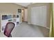Bright bedroom featuring a large closet and neutral carpet, perfect for relaxing and unwinding at 605 Anderson Dr, Deltona, FL 32725