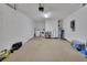 Spacious garage with laundry area, offering ample storage and functionality for various needs at 605 Anderson Dr, Deltona, FL 32725