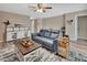 Cozy living area with a plush gray sofa and a stylish coffee table setup at 605 Anderson Dr, Deltona, FL 32725